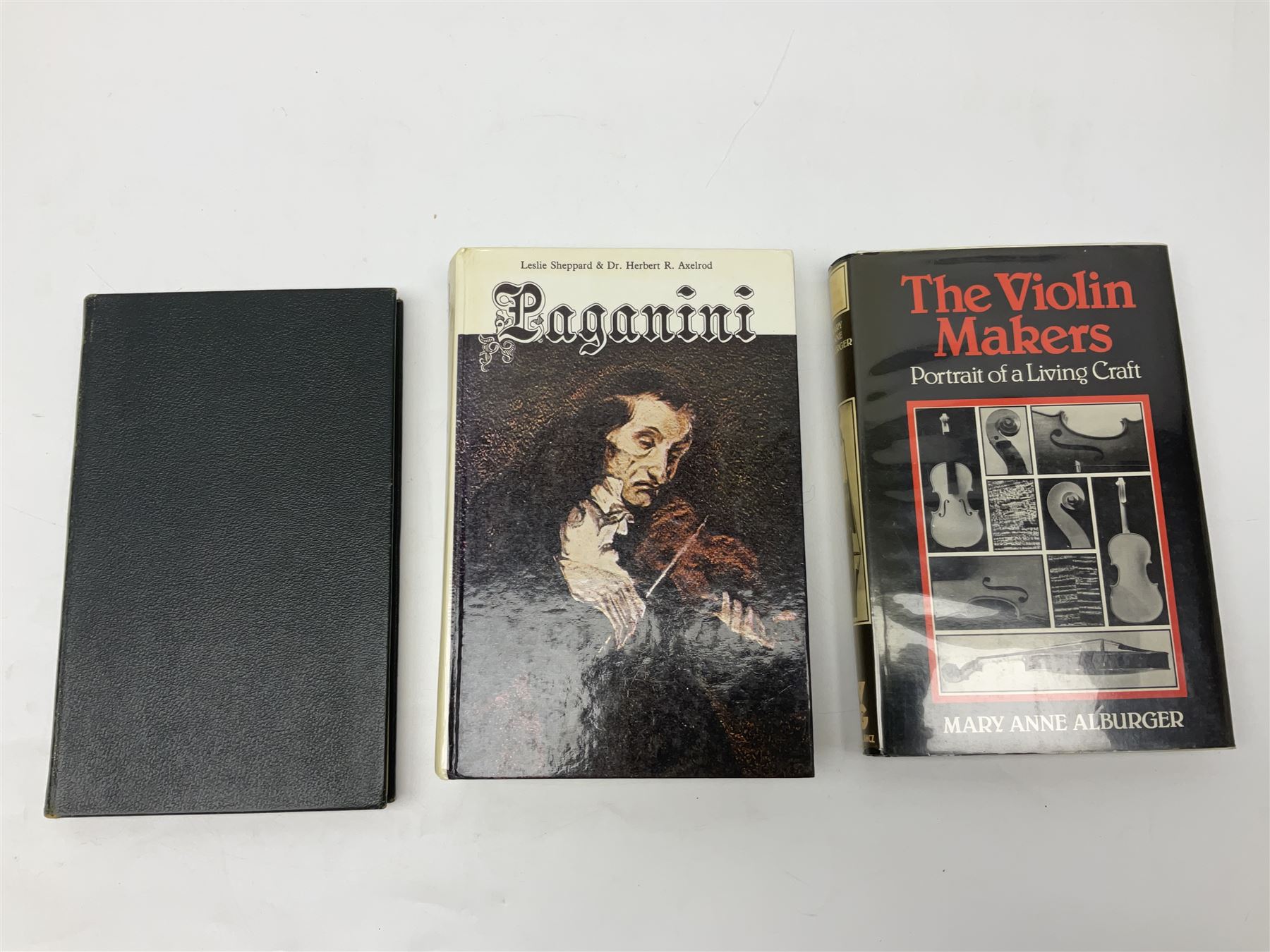 Fourteen books on violins and violin makers including Henley William: Universal Dictionary of Violin and Bow Makers. Five volumes. 1959/60. All first editions with dustjackets; Jalovec Karel: Encyclopaedia of Violin Makers. Two volumes. 1968. Vol.1 with d/j; Heron-Allen Ed.: Violin making As It Was, And Is. Two copies 1984 & 1991. Both with d/j; Henley W.: Antonio Stradivari. 1961; Fetis F.J.: Anthony Stradivari Celebrated Violin Maker. 1964 facsimile edition; Boyden David D.: catalogue of the Hill Collection of Musical Instruments in the Ashmolean Museum. 1979; and two others (14)