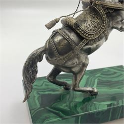 Modern silver model of a rearing horse, with ornate parcel gilt saddle and bridle, mounted upon a rectangular base, decorated with malachite panels to each side and upon four gilt bun feet, horse stamped 925, overall H14.5cm