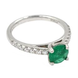 Platinum round emerald ring, with diamond set shoulders, hallmarked, emerald approx 0.80 carat