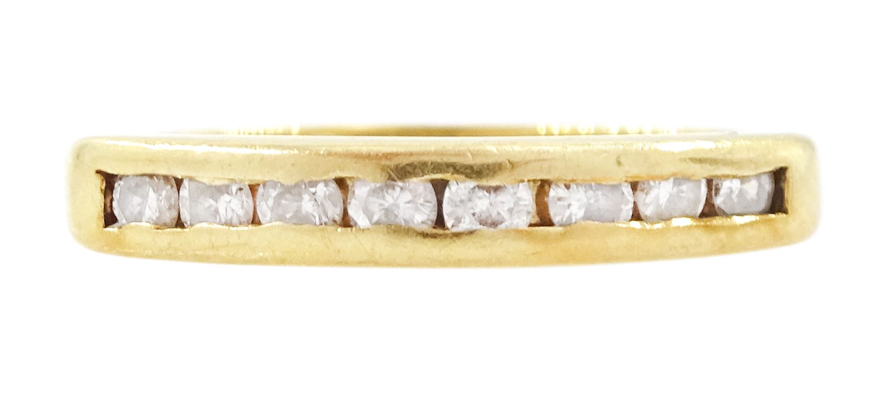 18ct gold diamond half eternity ring, channel set with eight round brilliant cut diamonds, London 1990