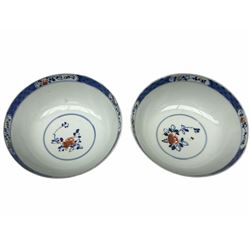 Pair of 20th century Chinese bowls, with enamelled floral decoration, and character mark beneath, D18cm