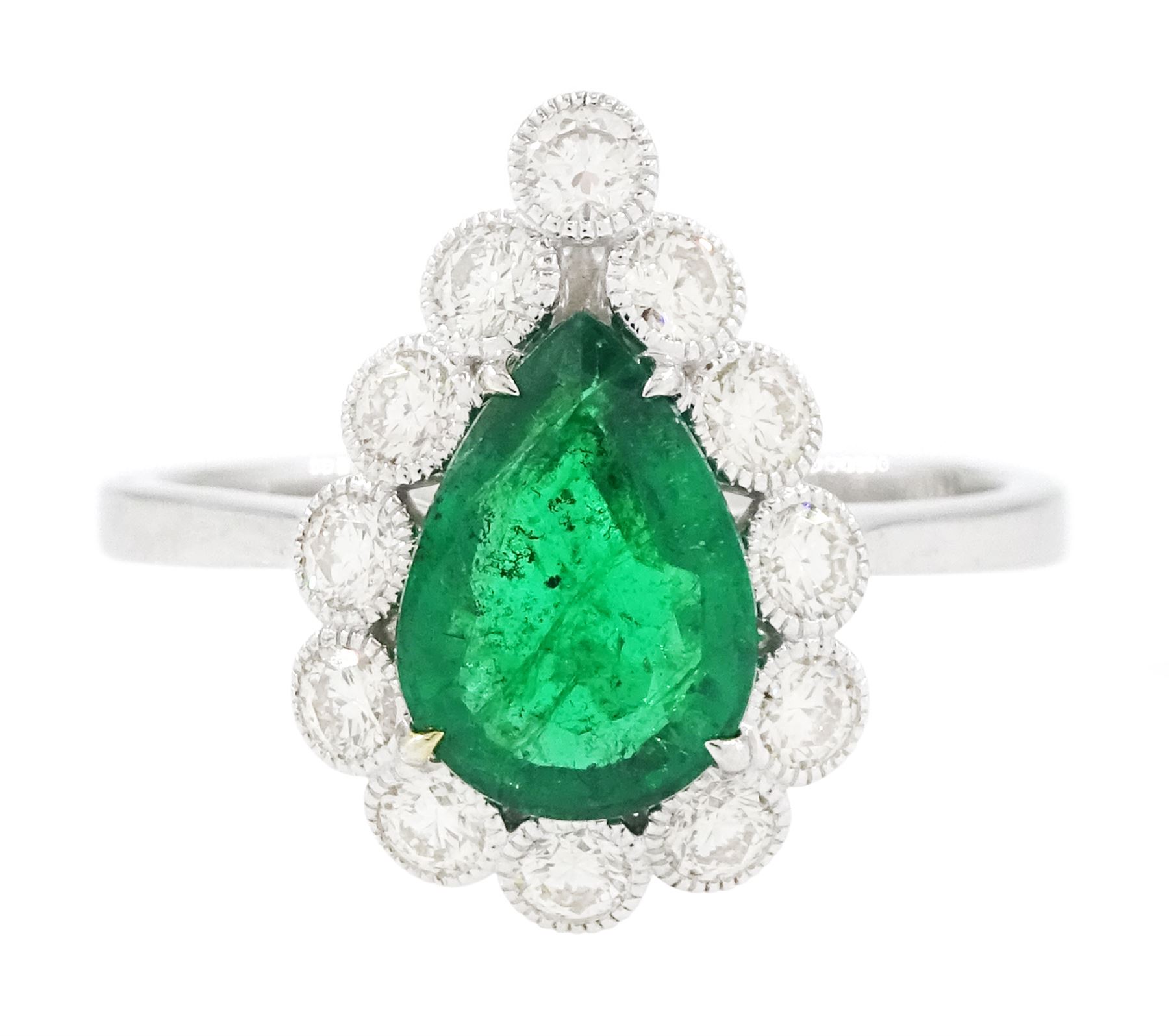 18ct white gold emerald and diamond cluster ring, single pear cut emerald of approx 1.40 carat, surrounded by twelve round brilliant cut diamonds, in a milgrain setting, stamped 750, total diamond weight approx 0.55 carat