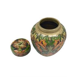 Moorcroft ginger jar, decorated in the Flame of the Forest pattern designed by Philip Gibson, with impressed and painted marks beneath, including date symbol for 1999, H15.5cm. 
