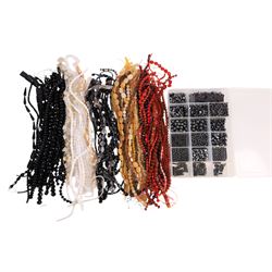 Seventy-six strings of polished gemstone and glass jewellery making beads and some loose b...