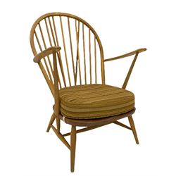 Mid-20th century Ercol light elm and beech hoop and stick back easy chair, with upholstered loose seat cushion in striped fabric
