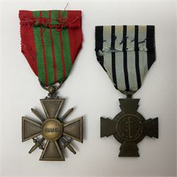 Four French medals - St. Helena medal with bust of Napoleon to obverse and inscription to reverse 'Campagnes de 1792 a 1815. A ses compagnons de gloire sa derniere pensée Ste. Hélène 5 Mai 1821', established by Emperor Napoleon III in 1857; two WW2 Croix-de-Guerre; and WW2 Croix-du-Combattant; all with ribbons (4)