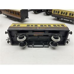 Exley '00' gauge - fourteen various coaches comprising four LMS maroon (3322 3rd, 2202 3rd, 6665 3rd and 388 Sleeping Car 3rd), LNER green/cream Buffet Car 21419, LNER teak 8639 1st, Southern green 6688 3rd, GWR brown/cream 3322 3rd, LNER 206 3rd, LNER 319 1st/3rd, SR green 351 3rd, SR green 188 Parcel Van, GWR 331 3rd and GWR 362 3rd; all unboxed (14)