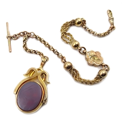  Victorian rose gold watch chain stamped 9ct, with attached 15ct gold (tested) swivel hardstone fob  