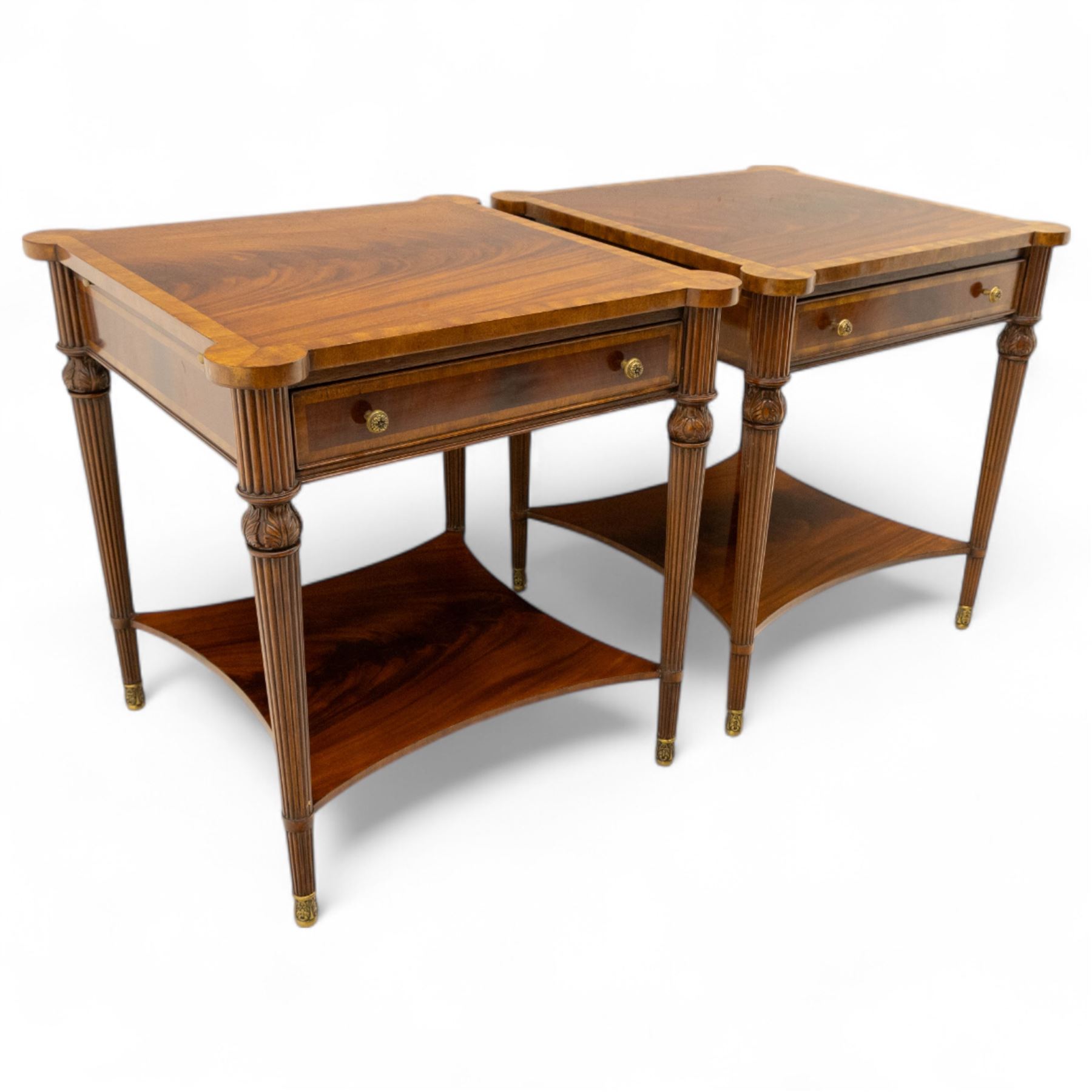 Maitland Smith - Pair of mahogany side tables, the rectangular top with rounded corners, the top edge inlaid with movingui wood, above two under-tier shelves, and frieze drawer, supported on stop-reed and acanthus foliate carved legs united by platform stretcher, raised on brass sabot foot caps