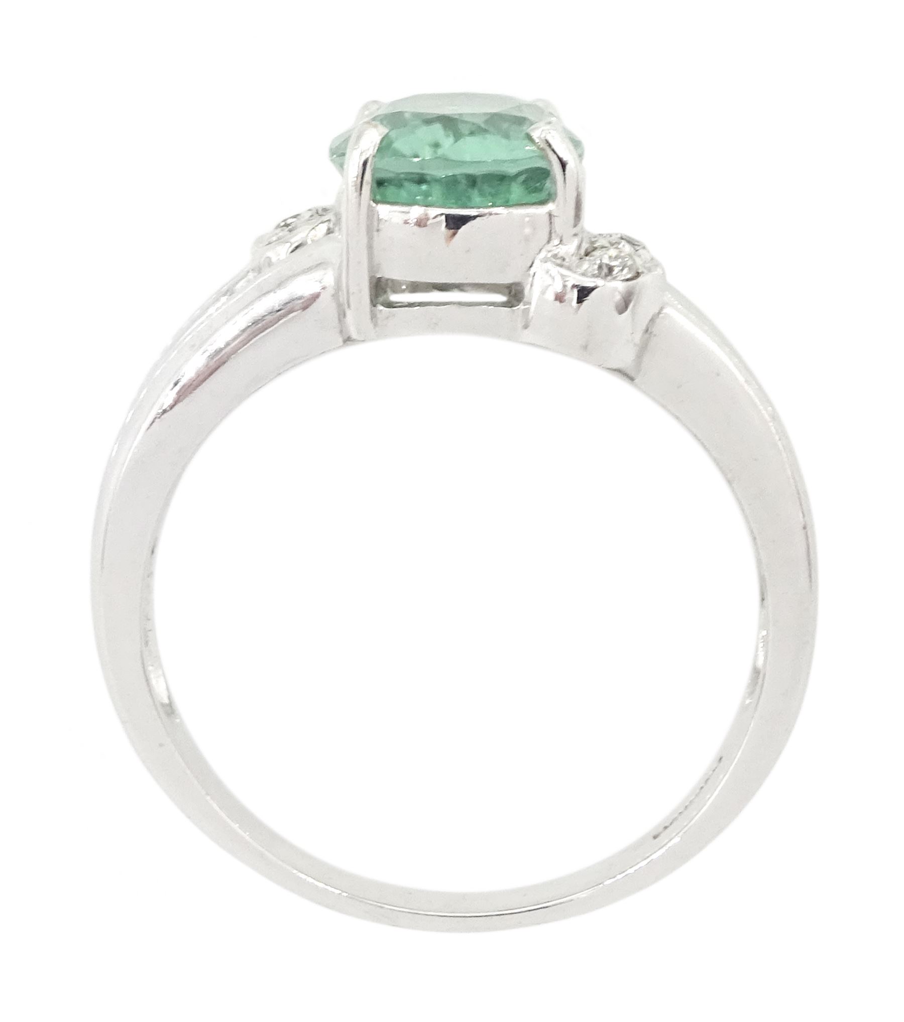 18ct white gold oval cut Paraiba tourmaline and round brilliant cut diamond ring, Birmingham 2006, tourmaline approx 1.80 carat