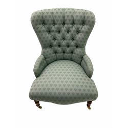 20th century Victorian style nursing chair, upholstered in green buttoned fabric