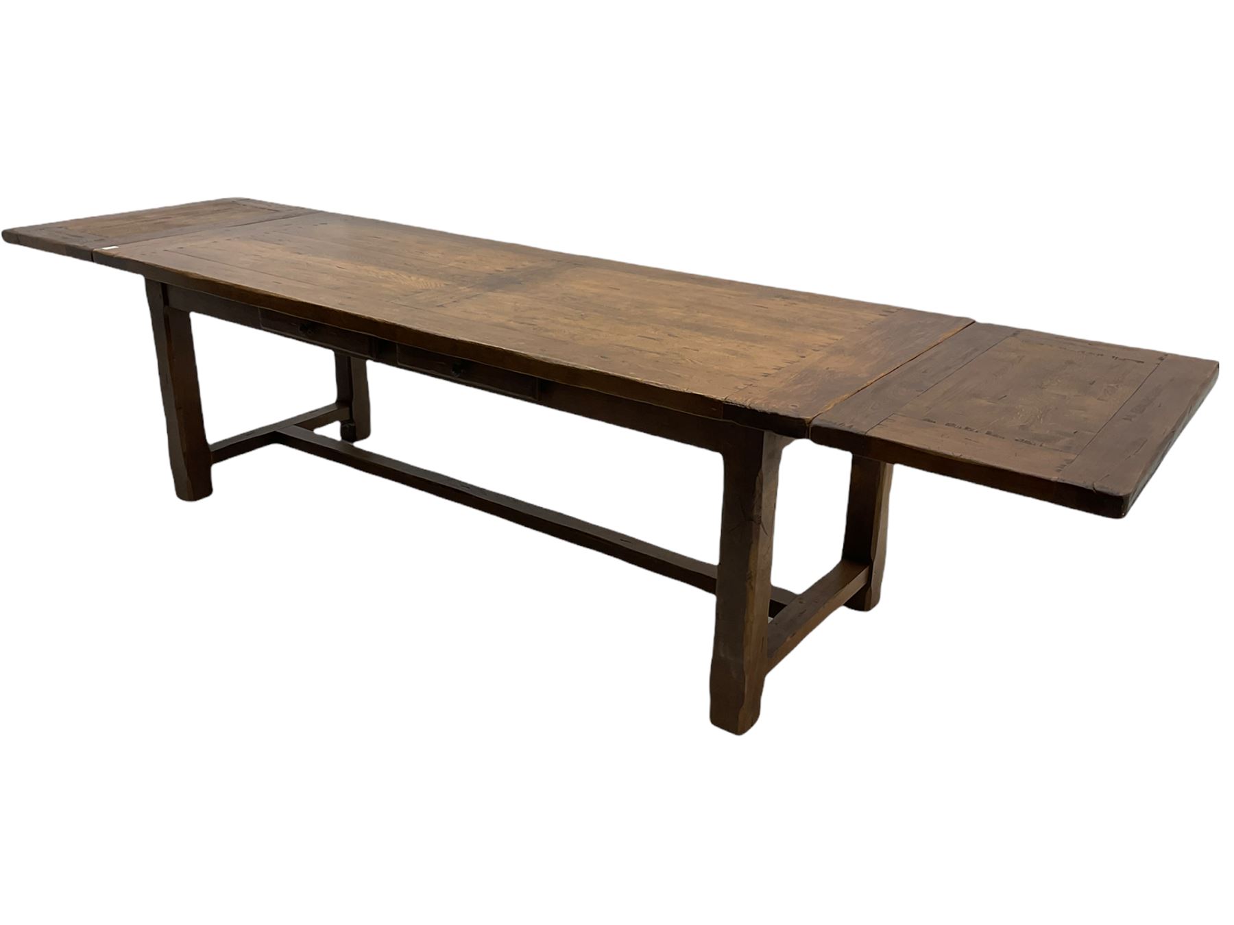 Antix French oak dining table with two leaves, two frieze drawers;, and six ladder back chairs with rush seats