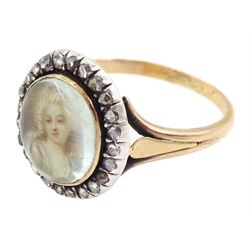 19th century French 18ct gold and silver diamond portrait ring, set with an oval miniature of a woman in 18th century dress on ivory, under a glazed panel, with rose cut diamond surround and trifurcated shoulders, hallmarked. This lot has been registered for sale under Section 10 of the APHA Ivory Act