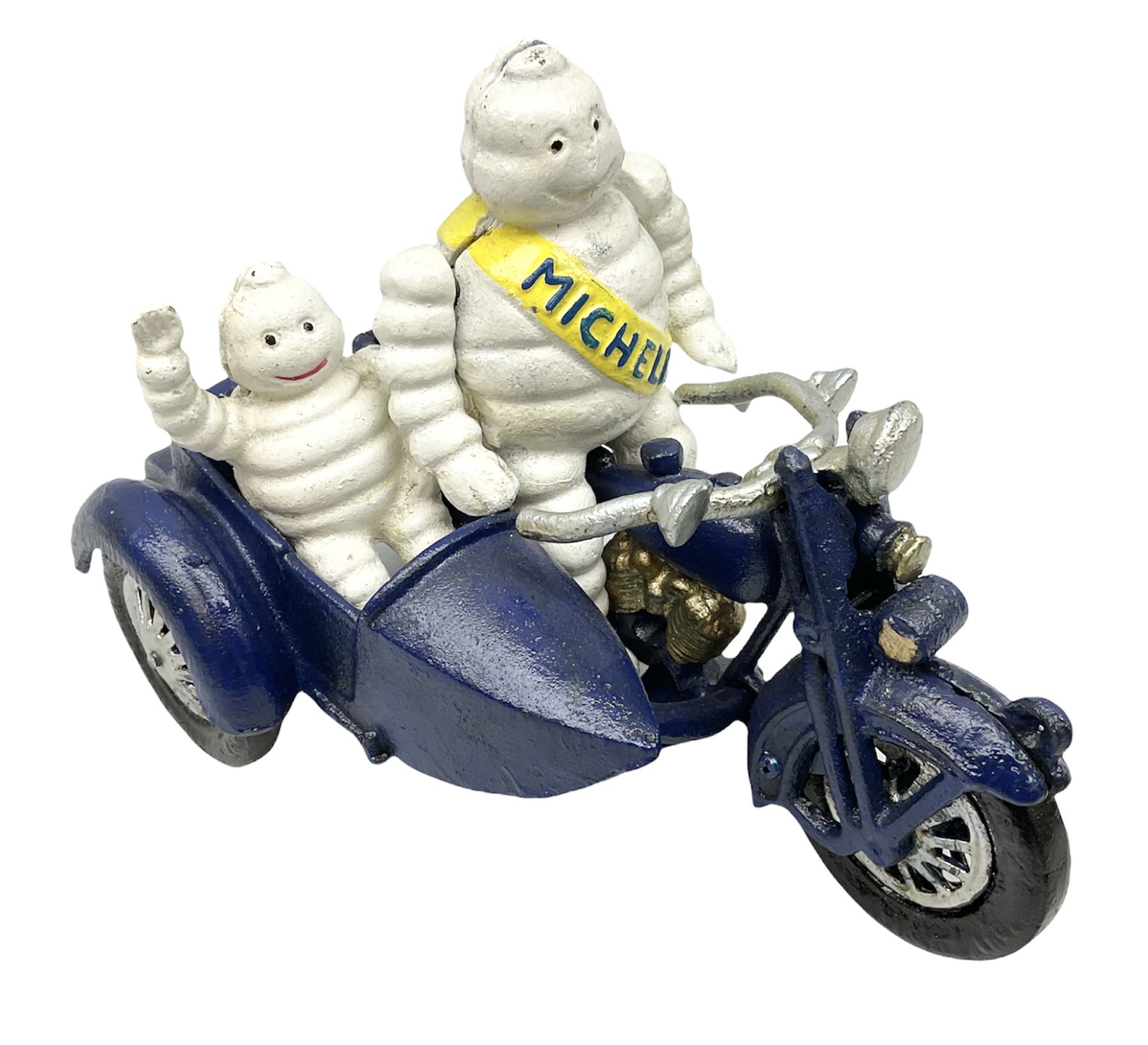 Cast iron figure of Michelin Man on motorbike modelled with smaller seated Michelin man in sidecar, H16cm