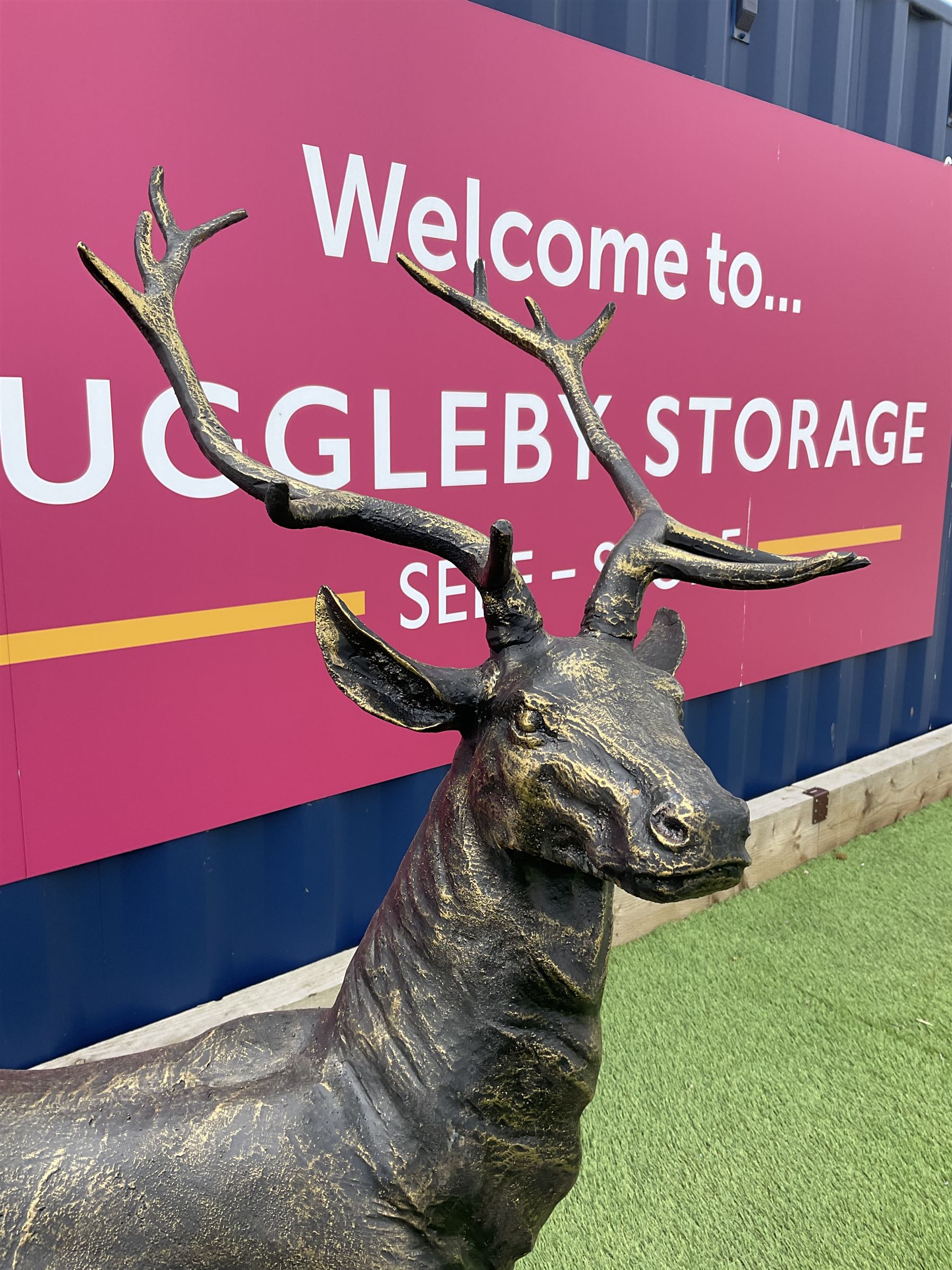 Bronzed cast iron life-size garden or indoor Stag, oval plinth base - THIS LOT IS TO BE COLLECTED BY APPOINTMENT FROM DUGGLEBY STORAGE, GREAT HILL, EASTFIELD, SCARBOROUGH, YO11 3TX