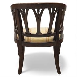 Late 20th century mahogany tub armchair, curved open back with pierced splat supports beneath a rounded top rail, upholstered drop-in seat in patterned fabric, raised on turned and ringed supports
