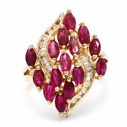 14ct gold ruby and diamond cluster ring, set with fifteen marquise cut rubies and fourteen...