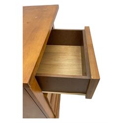 Pair of contemporary cherry wood bedside chests, rectangular top and projecting moulded cornice over three drawers, on plinth base with shaped apron