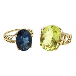 Gold oval peridot ring and a London blue topaz ring, both hallmarked 9ct