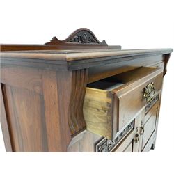 Late Victorian walnut side cabinet, raised shaped back relief carved with anthemion and scrolled foliage, fitted with two drawers over two cupboards