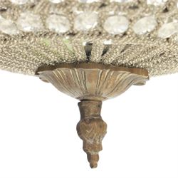 Late 19th century pair of French Empire gilt metal and cut glass bag chandelier, the tapering body formed of faceted glass button drops, with lobed lower bowl, cast foliate and mask mounts, surmounted by a bulbous upper section and terminating with a pendant finial