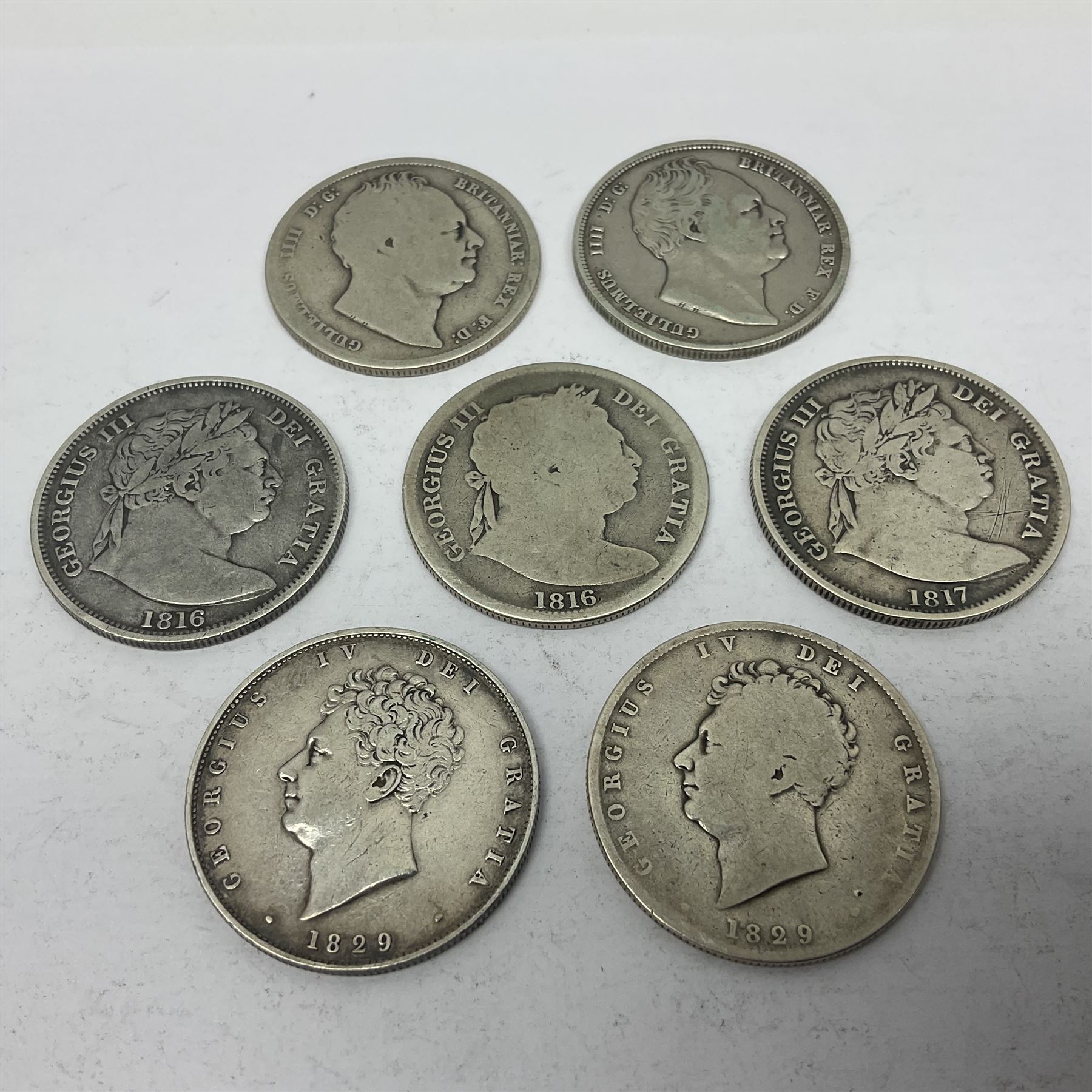 Approximately 95 grams of Great British pre 1920 silver half crown coins, including George III 1816, George IV 1829, William IIII 1836 etc