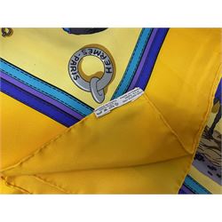 Hermès 'Ecuries' silk scarf, designed by Hugo Grygkar in 1947, printed with twenty horses in their respective stables, on yellow ground contained within stitched effect blue and purple and darker yellow gold borders, with rolled hand stitched edges and Hermes material label, 87cm square