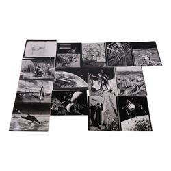 Fourteen black and white photographs of artwork by Ralph Andrew Smith, including images us...