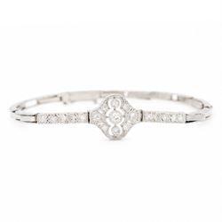Art Deco white gold and platinum diamond bracelet, the central articulated panel milgrain set with old and single cut diamonds, to a white gold expanding link bracelet, stamped 18ct