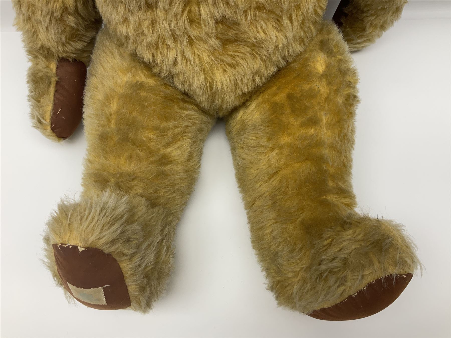 Large post-war Chad Valley plush covered teddy bear with revolving head, applied eyes, vertically stitched nose and mouth, jointed limbs and growler mechanism; stitched label to right foot and Hygenic Toys label to right side H73cm