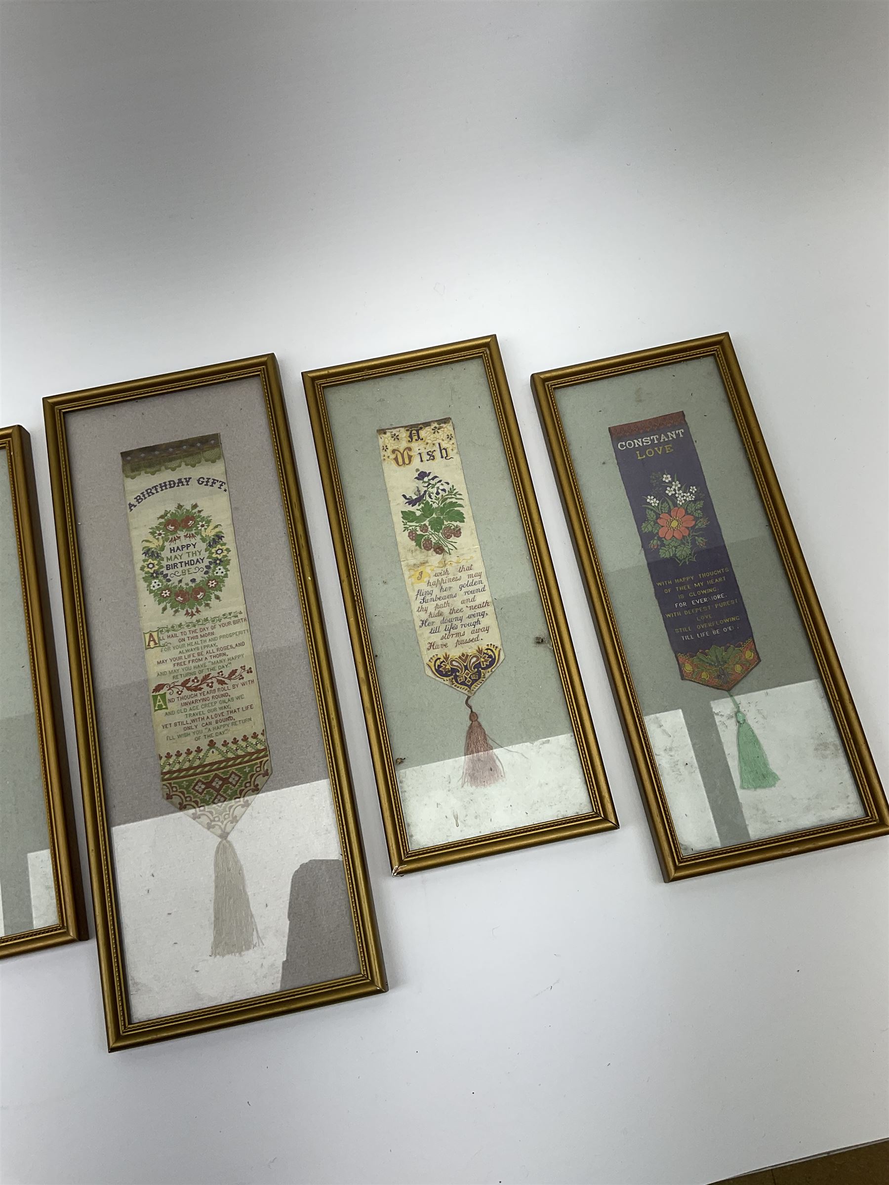 Six framed and glazed Stevengraph silk bookmarks, largest overall H33cm L13cm.