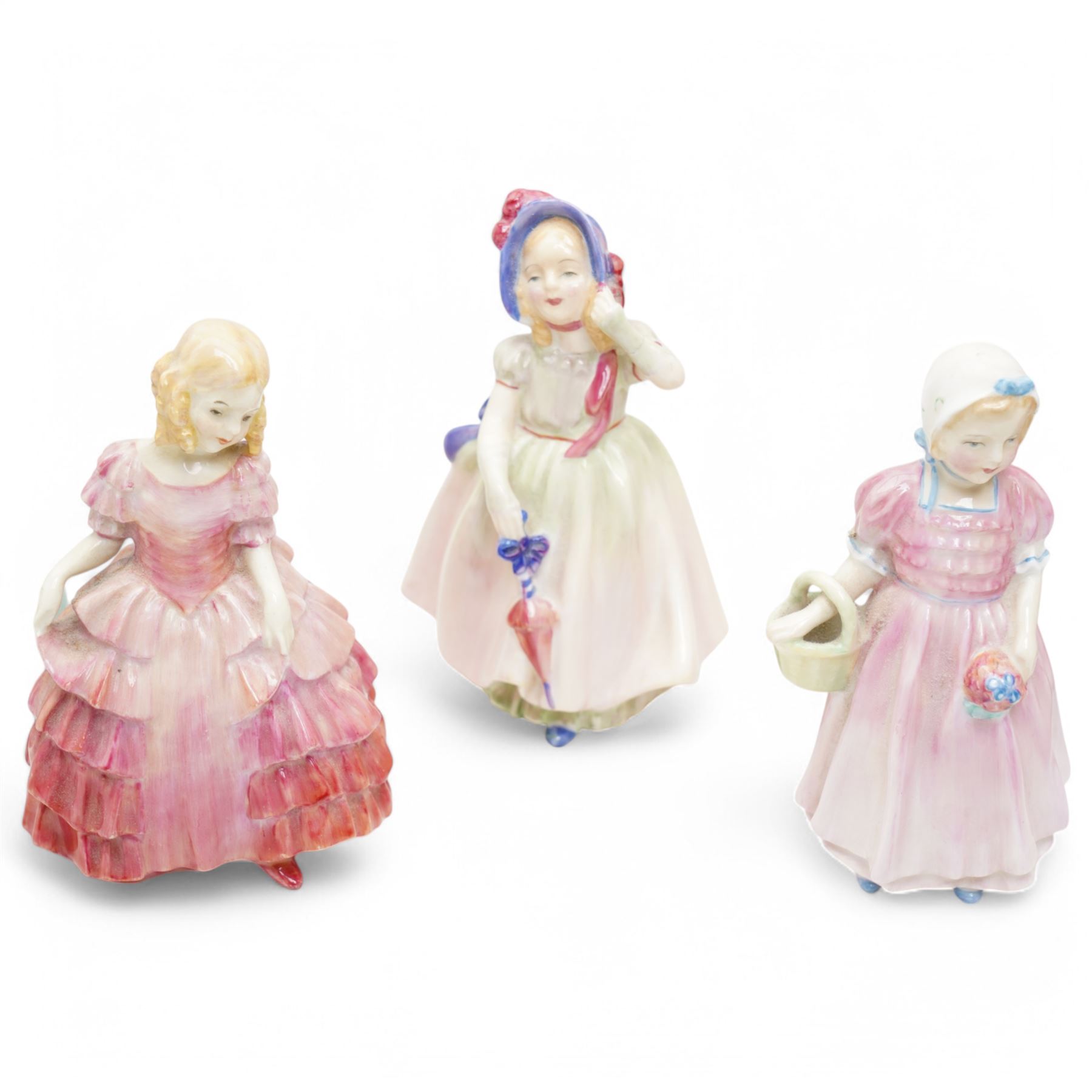 Collection of ten Royal Doulton figures, comprising 'Lady Charmian' HN1948, 'Rose' HN1368, 'Tinkle Bell' HN1677, 'Babie' HN1679, 'Southern Bell' HN2229, 'Wistful' HN2472, 'Janice' HN2022, 'Top O' The Hill' HN1849, 'The Old Balloon Seller' HN1315, and 'Blithe Morning' HN2065 (10)