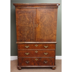  18th century and later cross banded burr walnut cupboard on chest, projecting cornice, two panelled cupboard doors enclosing seven graduating drawers, above three base drawers, on bun feet, W112cm, H175cm, D60cm  