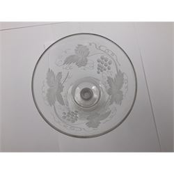 Set of three 18th century style wine glasses, each with funnel bowl etched with fruit vine, upon a double series air twist stem and circular foot, H17cm