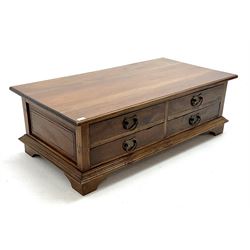 Hardwood eight drawer coffee table, moulded top and bracket supports 