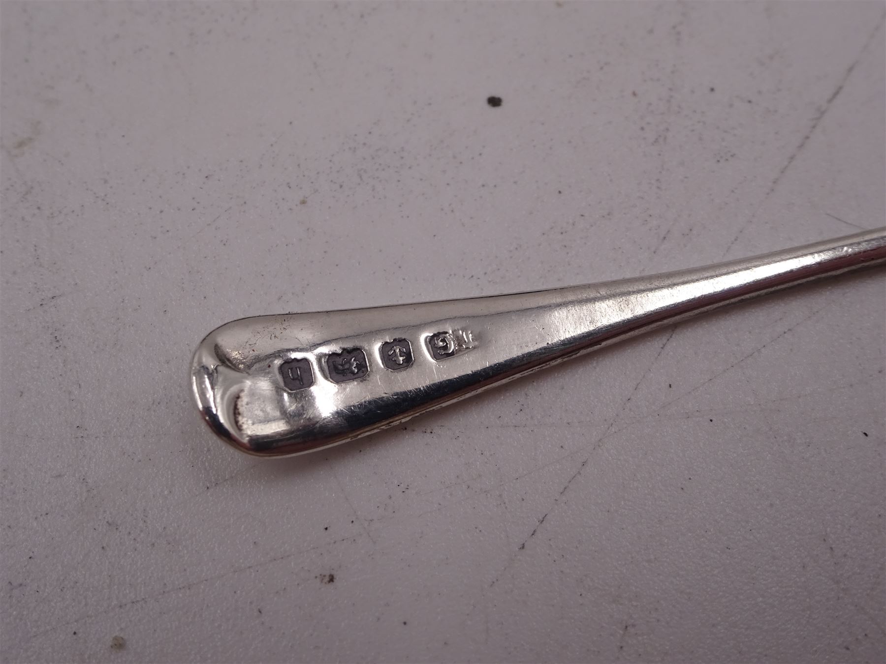 Group of silver, comprising pair of Edwardian silver open salts, of circular form, with repousse floral and C scroll decoration, and pair of matching salt spoons, hallmarked Joseph Gloster, Birmingham 1907, in tooled leather velvet and silk lined fitted case, together with a Victorian silver cream jug, of helmet form, with repousse floral decoration, hallmarked S Blanckensee & Son Ltd, Birmingham 1897, a mid 20th century silver bon bon dish, of circular form, with pierced sides, upon stepped foot, hallmarked Birmingham 1956, maker's mark worn and indistinct, a Victorian silver pepper, hallmarked Thomas Hayes, Birmingham 1895, and a silver thimble, stamped sterling