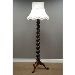  Carved walnut standard lamp with shade (H150cm (excluding fitting)), and an oval framed bevelled edge mirror  