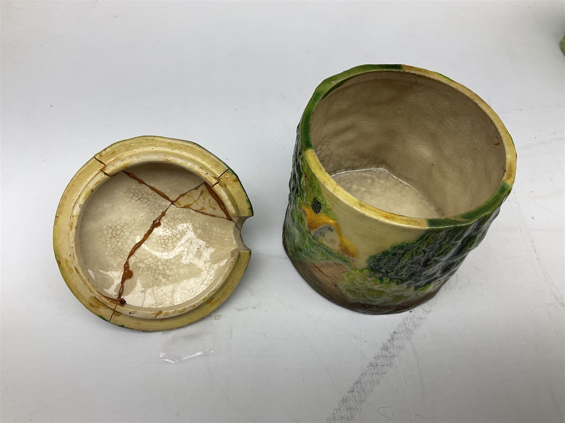 Collection of Japanese Maruhon ware novelty preserve pots, to include examples modelled as a windmill and cottages, together with other 1920s and 30s Art Deco style preserve pots, etc