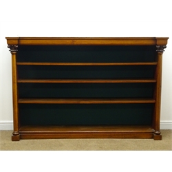  Victorian mahogany open bookcase, with shaped moulded white marble top and three shelves enclosed by Corinthian capped projecting columns on a skirted base, W188cm, H125cm, D42cm  