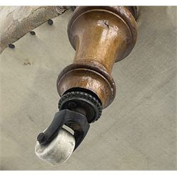 Victorian walnut framed nursing chair, upholstered in buttoned floral pattern fabric, on turned front feet 