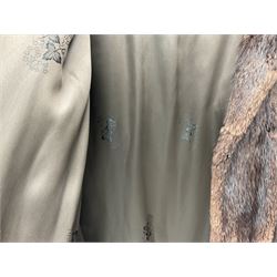 Ladies dark brown three quarter length musquash fur coat, labeled 'Hammonds Fur Salon', together with a ladies white fur coat and a brown fur shawl