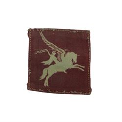 WWII Parachute Regiment insignias, comprising two shoulder titles, Pegasus formation badge, cloth wings and cap badge 