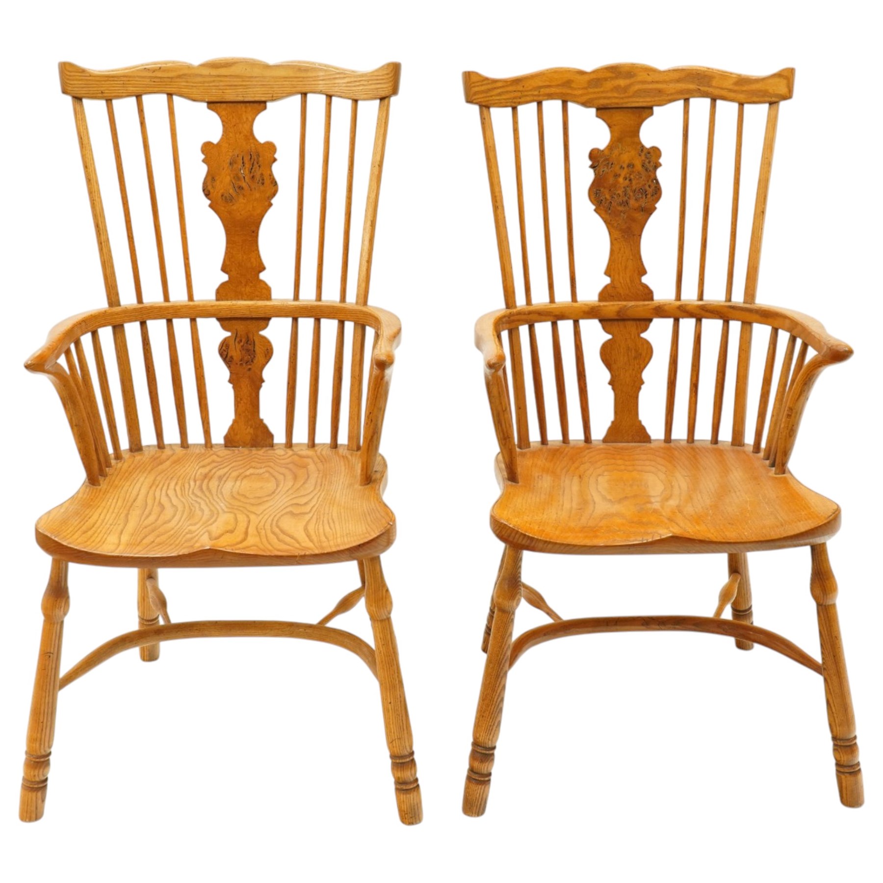 Quality set of six (4+2) golden figured and burr oak Windsor chairs, the yoke-shaped cresting rail over a vasiform shaped splat and spindle back, shaped saddle seat raised on turned supports united by crinoline stretcher