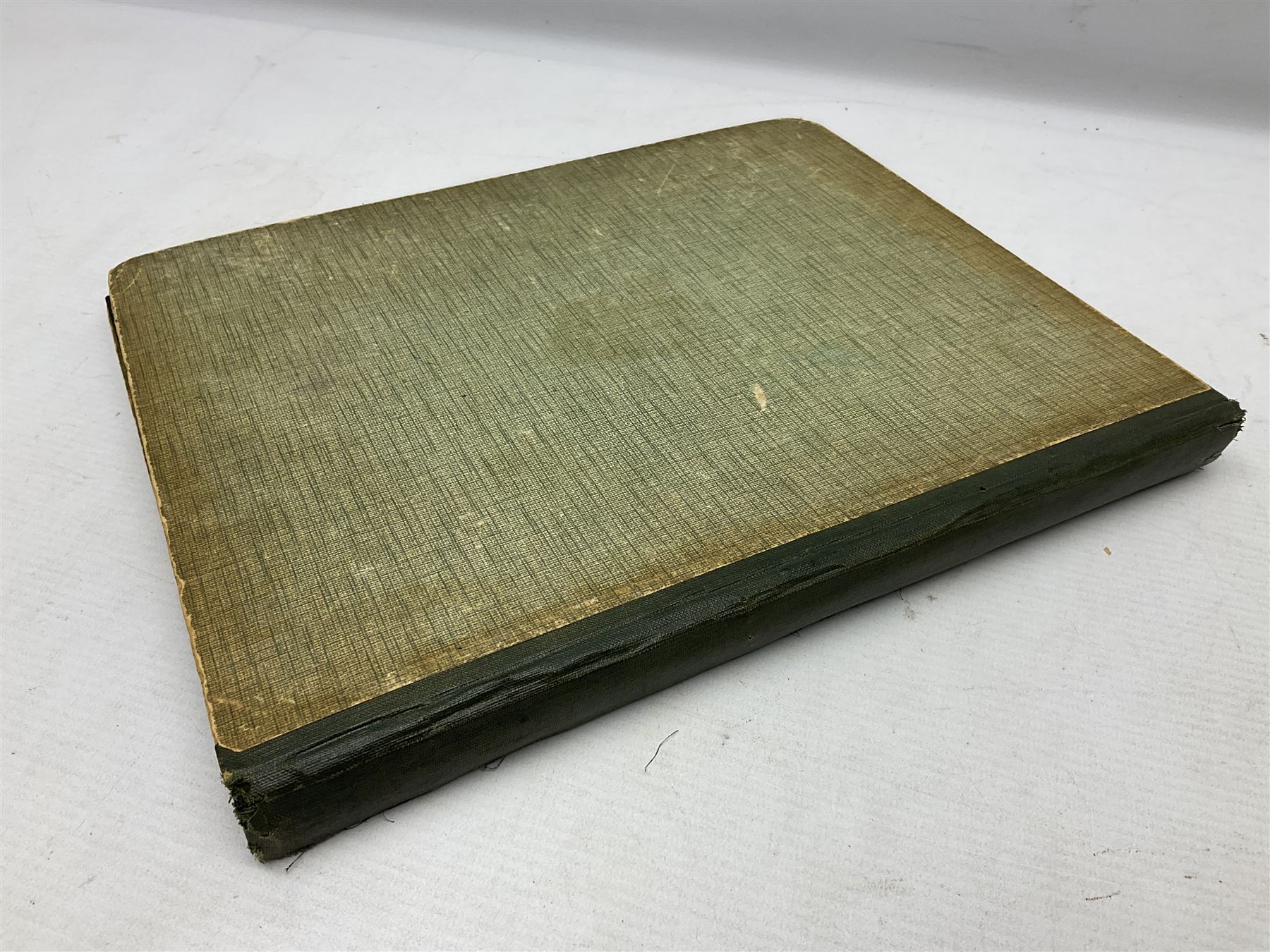 Victorian scrapbook containing twenty-six double sided pages and two fixed end pages of various fixed decoupage to include clippings of maritime interest, greeting cards, portraiture, flowers, animals etc, 