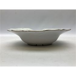 19th century French faience barber's blood-letting bowl, with painted floral decoration in polychrome upon plain ground, with painted initials CT mark beneath, L31cm