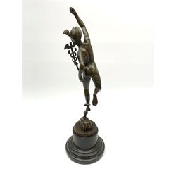 Bronze figure modelled as winged Mercury, raised upon a stepped base, H42cm overall
