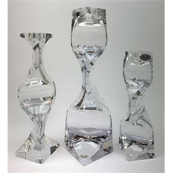 Three graduated Rogaska art glass candlesticks, largest H28.5cm. 