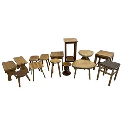 Collection of 20th century oak stools of varying form, together with nest of tables and a plant stand (15)