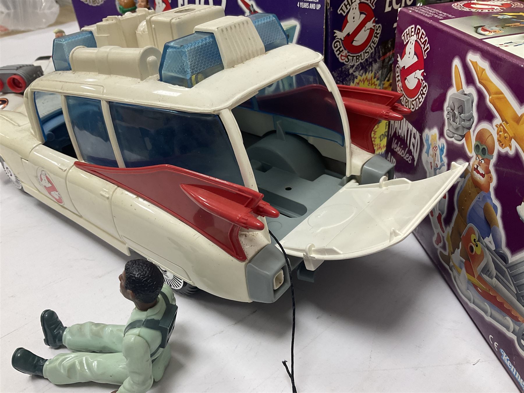 Ghostbusters - 'ECTO 1' car with two figures; ECTO-2 Vehicle, Highway Hunter Action Ghost Vehicle and Haunted Vehicles Air Sickness; all boxed; racing car with Egon Spengler driver; two 1984 Marshmallow Man figures; and four unopened carded/boxed figures etc