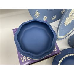 Collection of Wedgwood Jasperware, to include black Eisenhower Bust, two black basalt paperweights, one depicting an eagle and one depicting Julius Caesar, a blue Zodiac plate, Man on the Moon commemorative plate, American Independence Bicentennial plate and Royal commemorative ware, etc, all with impressed marks beneath, some with boxes